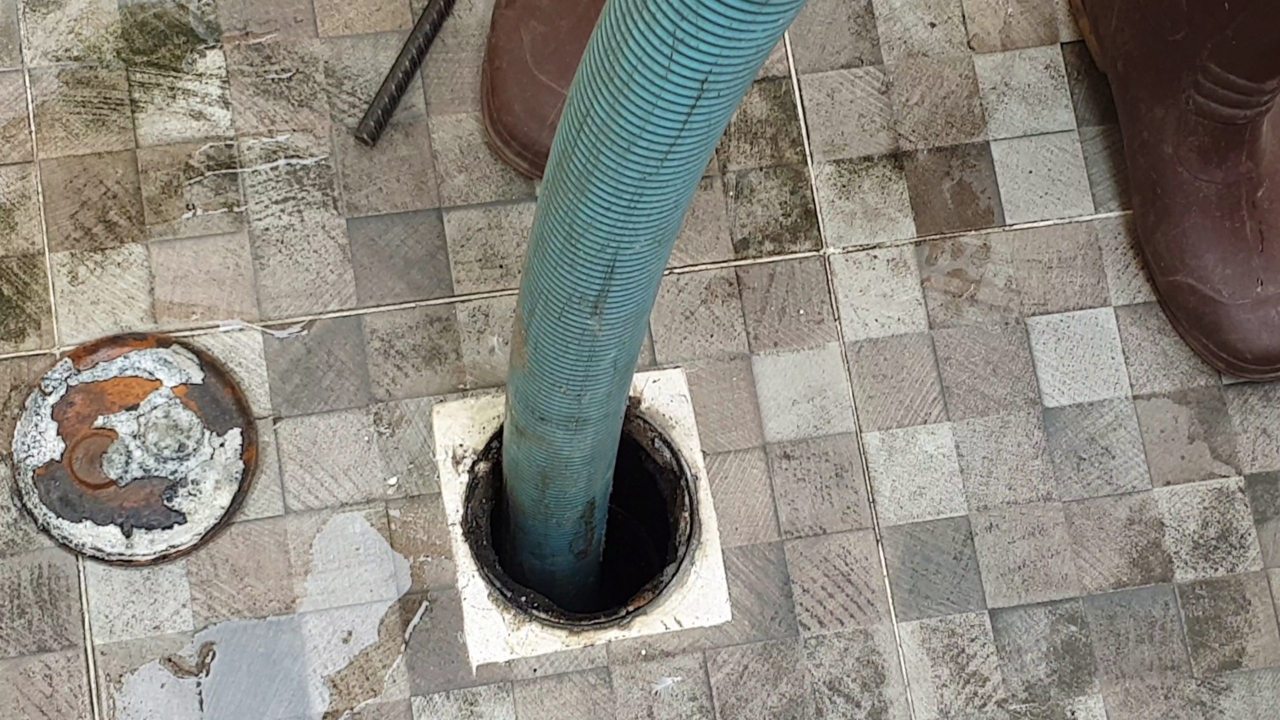 Septic tank sewage waste pumping and cleaning at a residence